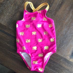 Gold elephant bathing suit. New without tags